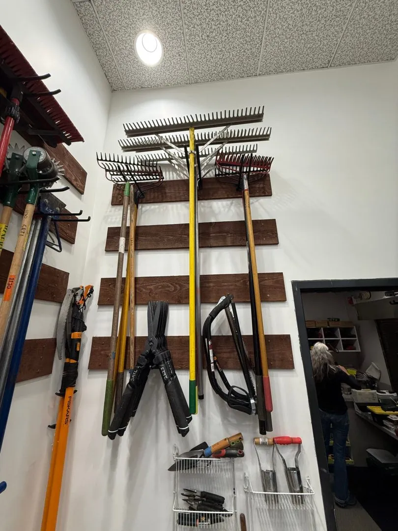 Garden tools and loppers on the wall